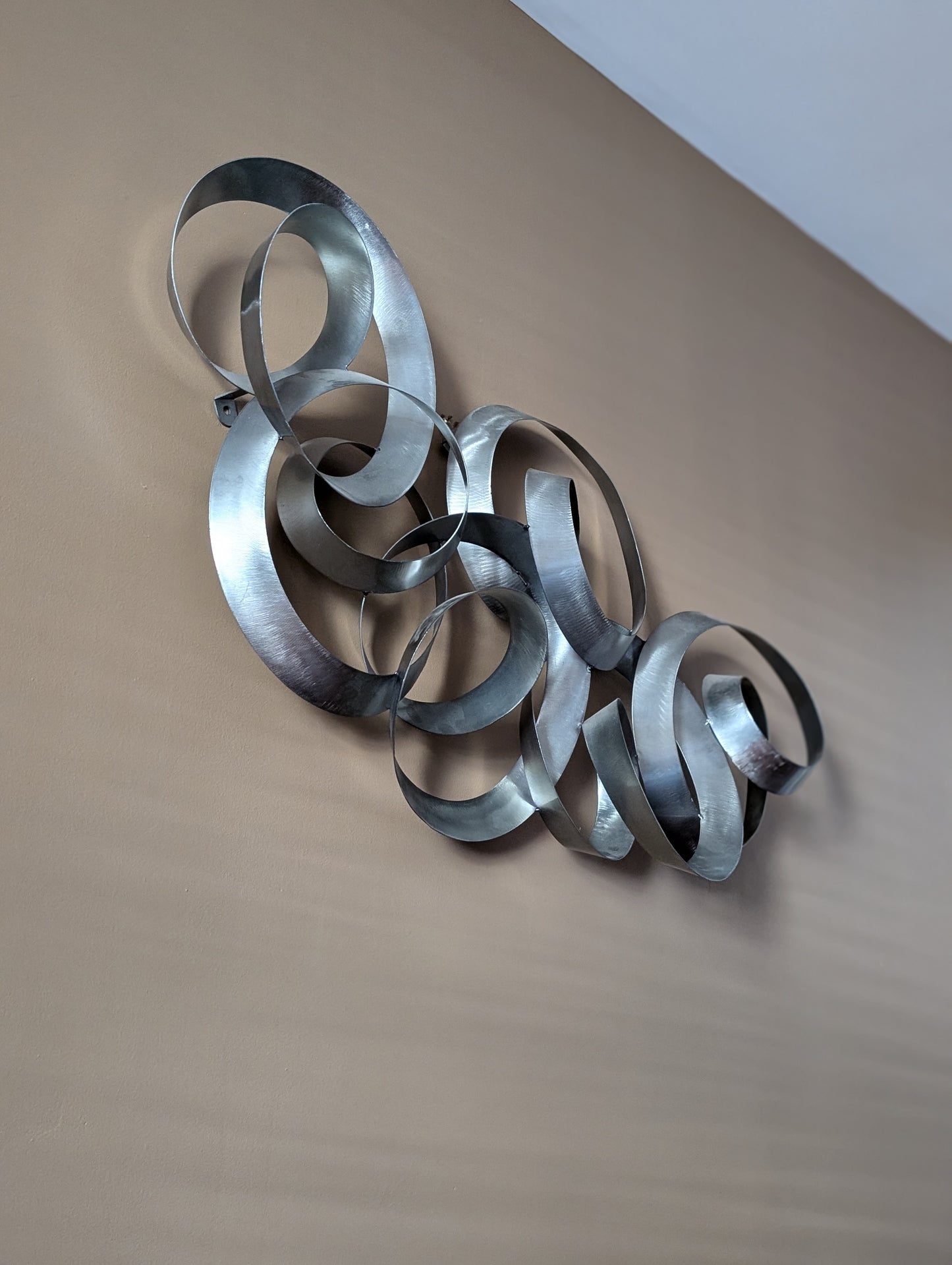 Curtis Jere "Continuity" Brushed Steel Wall Sculpture – Artisan House, 41" x 22"