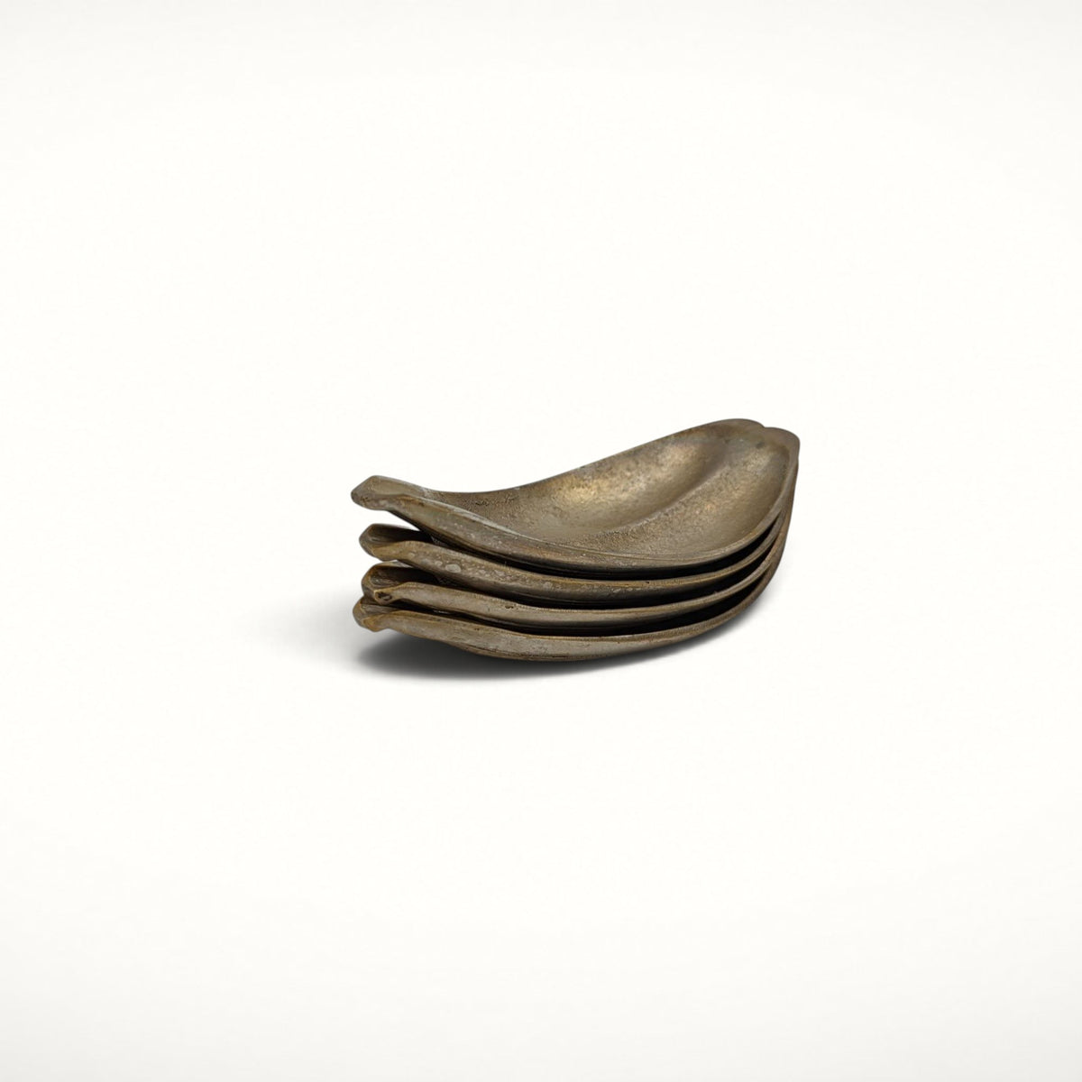 Set of 4 S. Agudo pewter ashtrays, stacked, side view