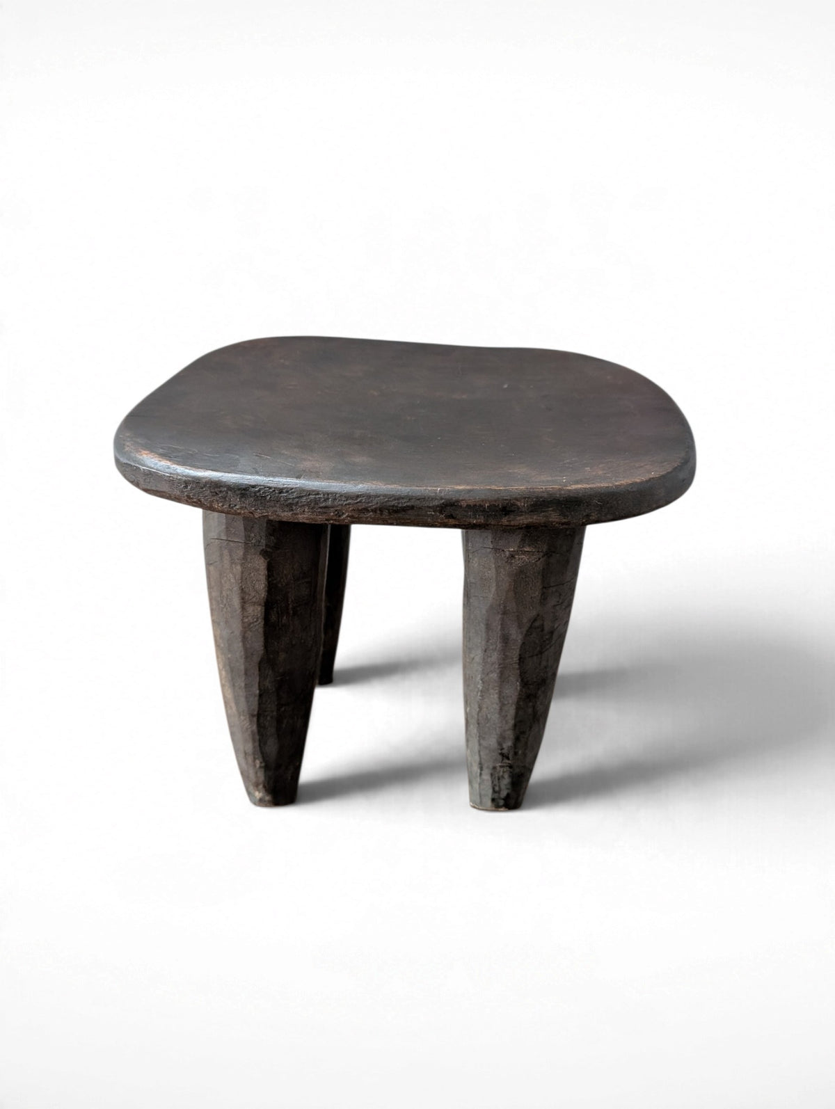 Vintage rustic hand-carved African Senufo stool, solid wood, four tapered legs, 11.75x10x9.5 inches tall