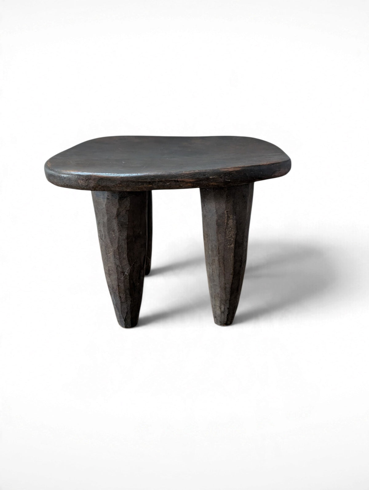 Vintage rustic hand-carved African Senufo stool, solid wood, four tapered legs, 11.75x10x9.5 inches tall