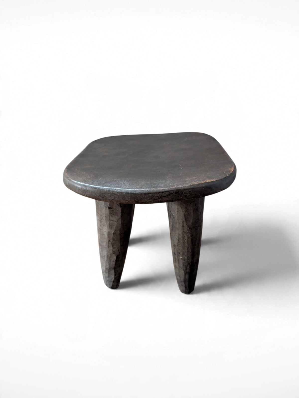 Vintage rustic hand-carved African Senufo stool, solid wood, four tapered legs, 11.75x10x9.5 inches tall