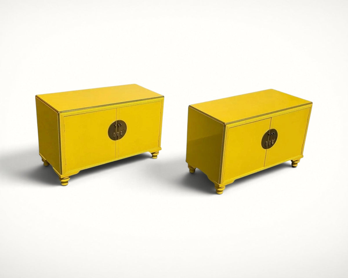 Pair of Baker Far East Collection yellow lacquer cabinets by Michael Taylor, three-quarter view