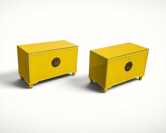 Pair of Baker Far East Collection yellow lacquer cabinets by Michael Taylor, three-quarter view