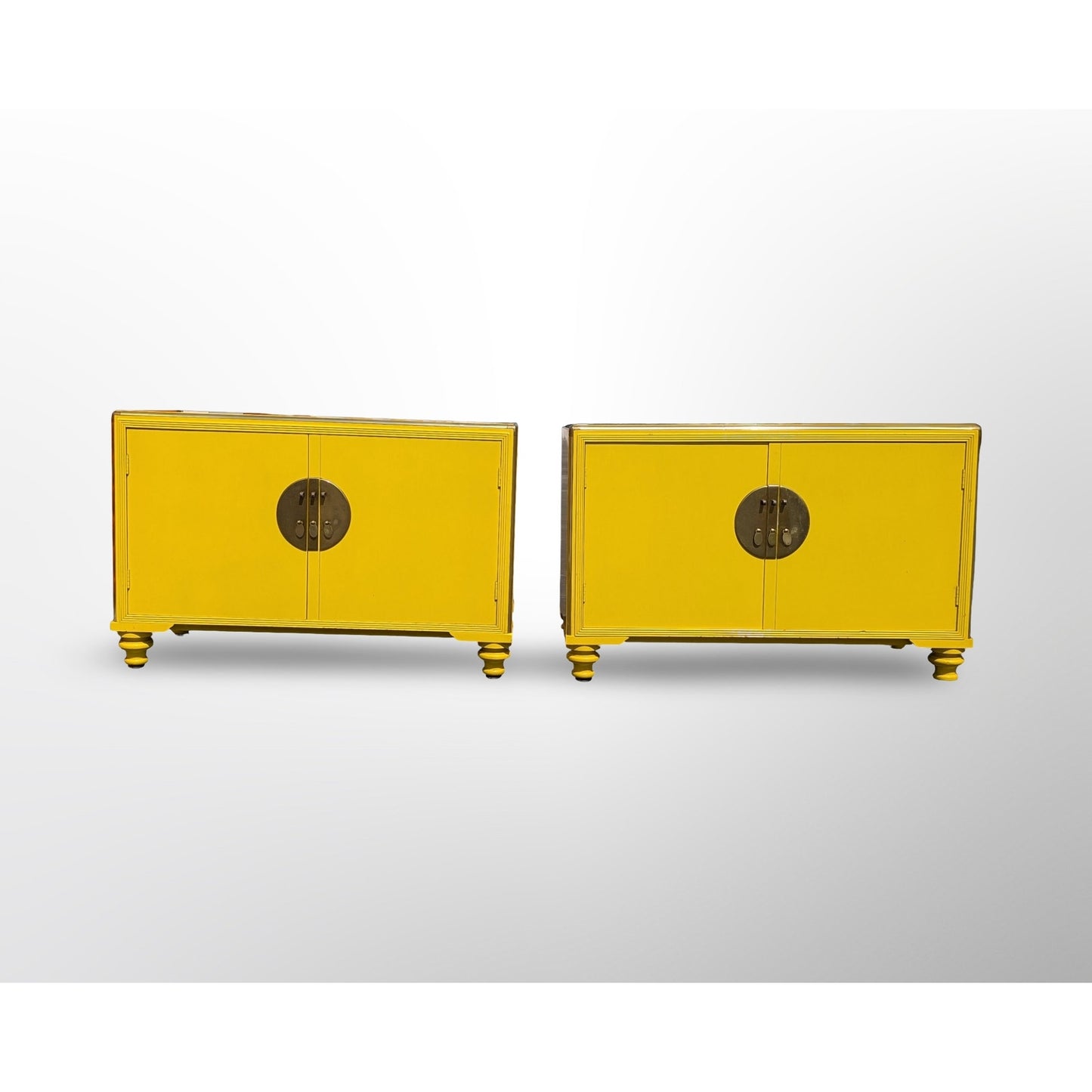 Detail of brass hardware on Baker Far East Collection cabinet by Michael Taylor yellow lacquer