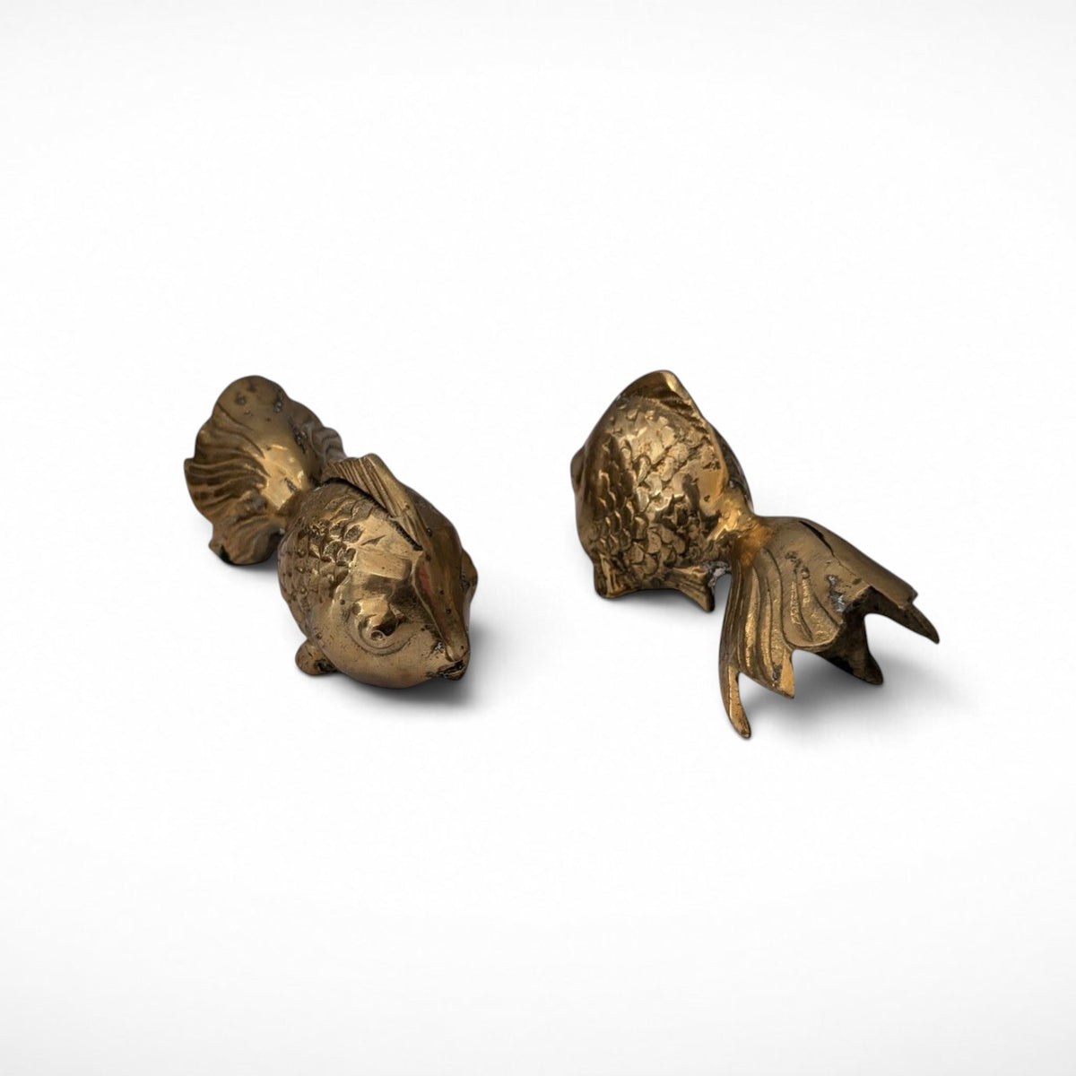Pair of vintage brass koi fish paperweights, front view