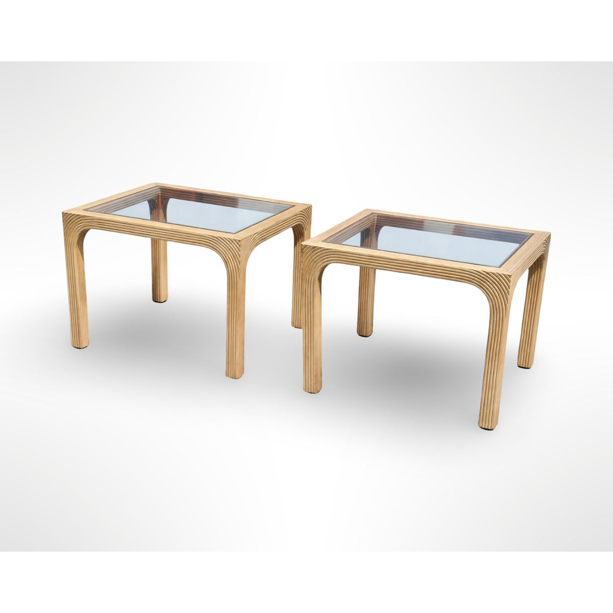 Pair of vintage split reed side tables with removable glass tops in a mid century modern organic design
