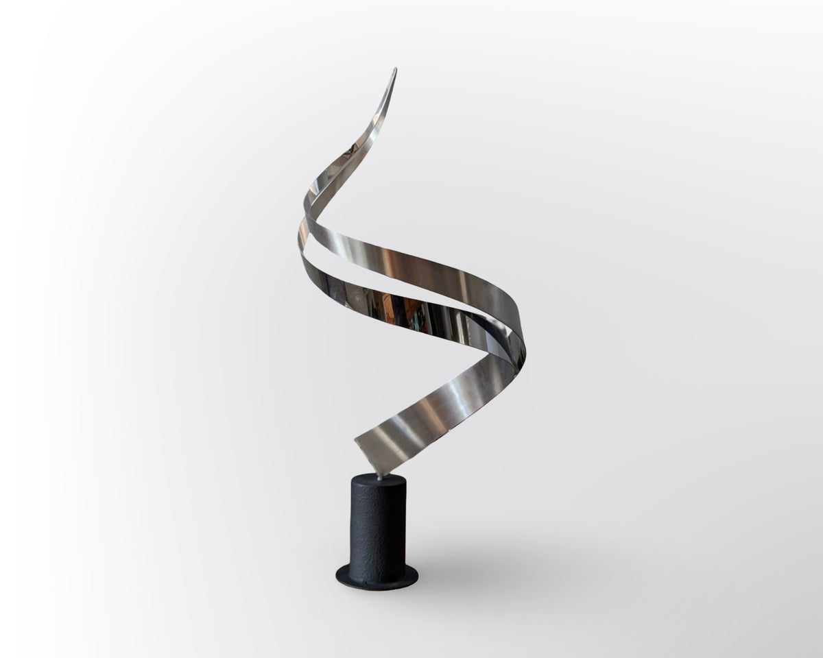 Vintage signed Curtis Jere ribbon swirl sculpture with heavy base in mid century modern abstract metal design