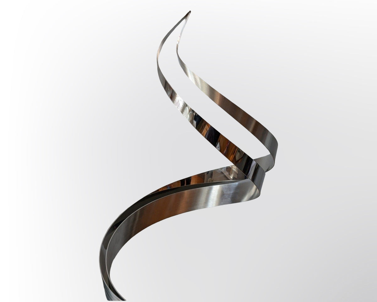 Vintage signed Curtis Jere ribbon swirl sculpture with heavy base in mid century modern abstract metal design