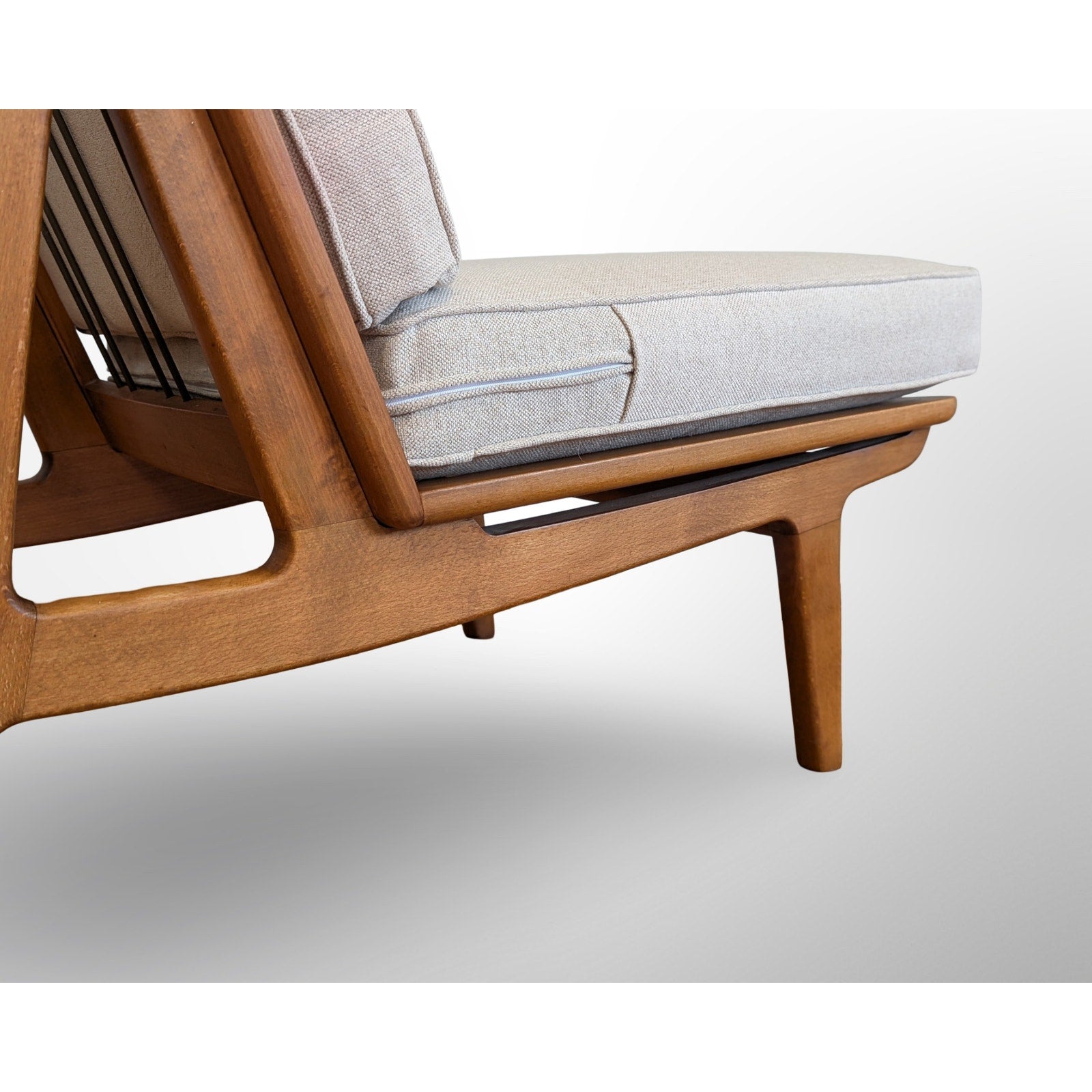 Detail of wood frame on Hvidt Molgaard FD172 Danish modern slipper chair