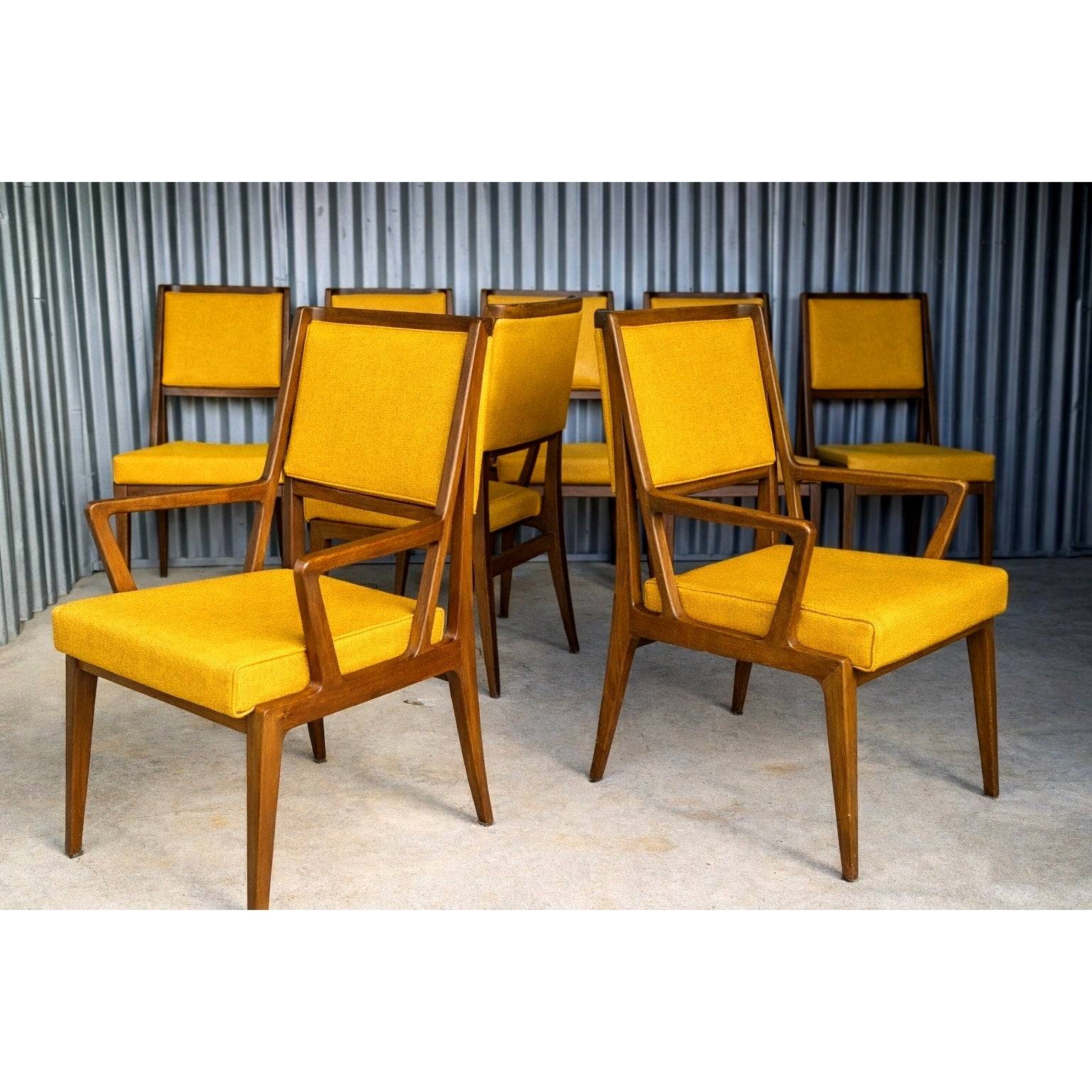 Set of eight Gio Ponti for Singer & Sons walnut dining chairs models 231 and 233 in mid century modern design