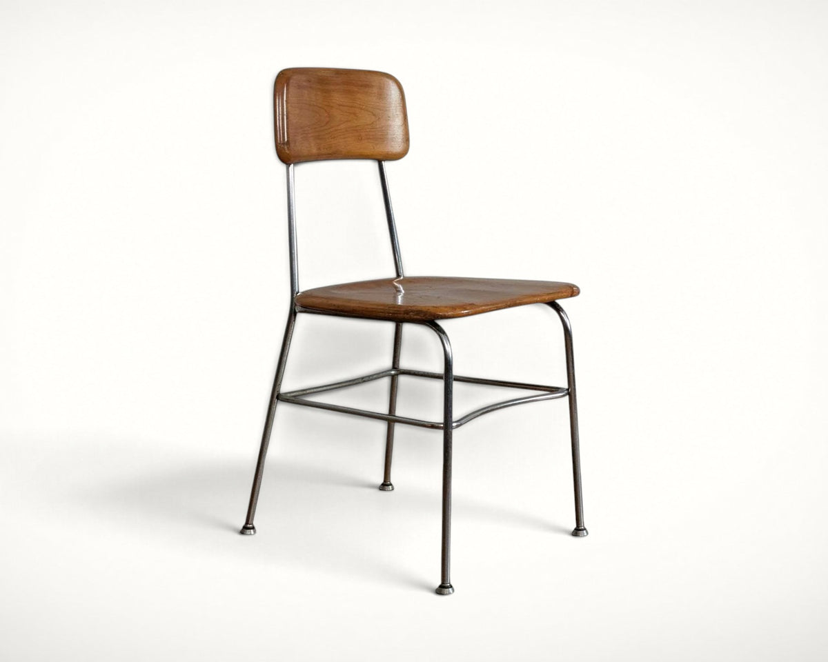 Heywood Wakefield Thin Line maple and chrome chair, front three-quarter view