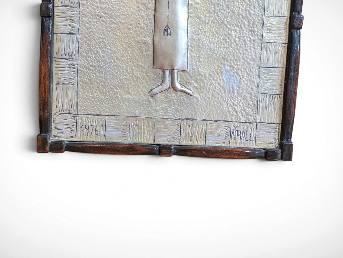Vintage Kroll framed mid century modern religious folk metal art, signed and dated 1976, silver figure with birds in wood frame, 24.25 x 10.25 x .75 inches