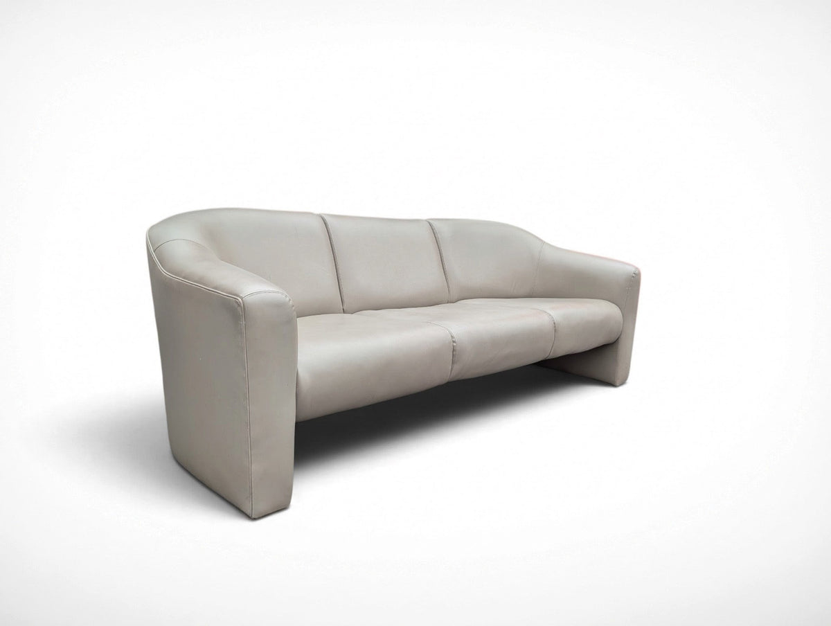 Vintage Milo Baughman for Thayer Coggin Institutional gray leather three seater sofa with curved sled legs and original manufacturer's tag