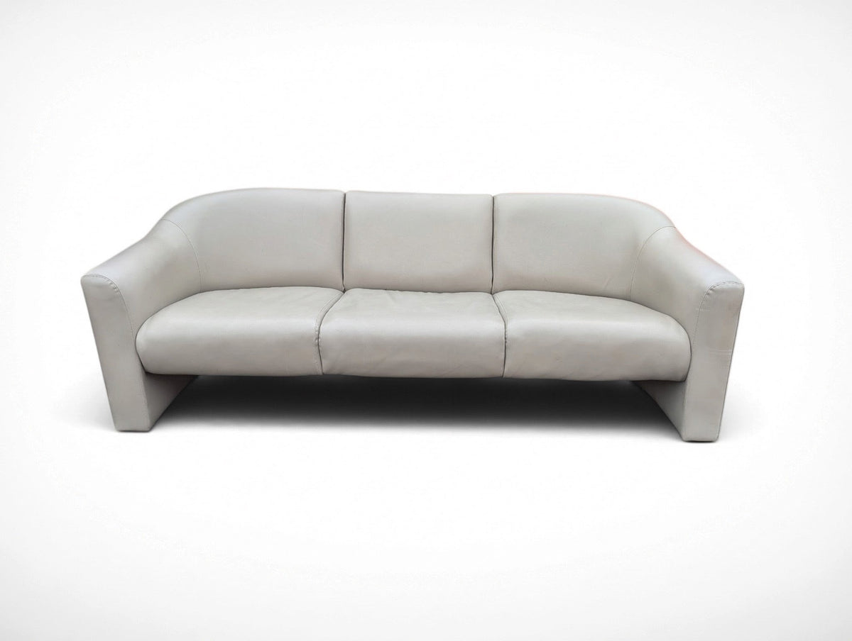 Vintage Milo Baughman for Thayer Coggin Institutional gray leather three seater sofa with curved sled legs and original manufacturer's tag