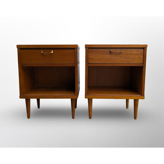Pair of restored mid century modern walnut nightstands with brass pulls and minimalist design