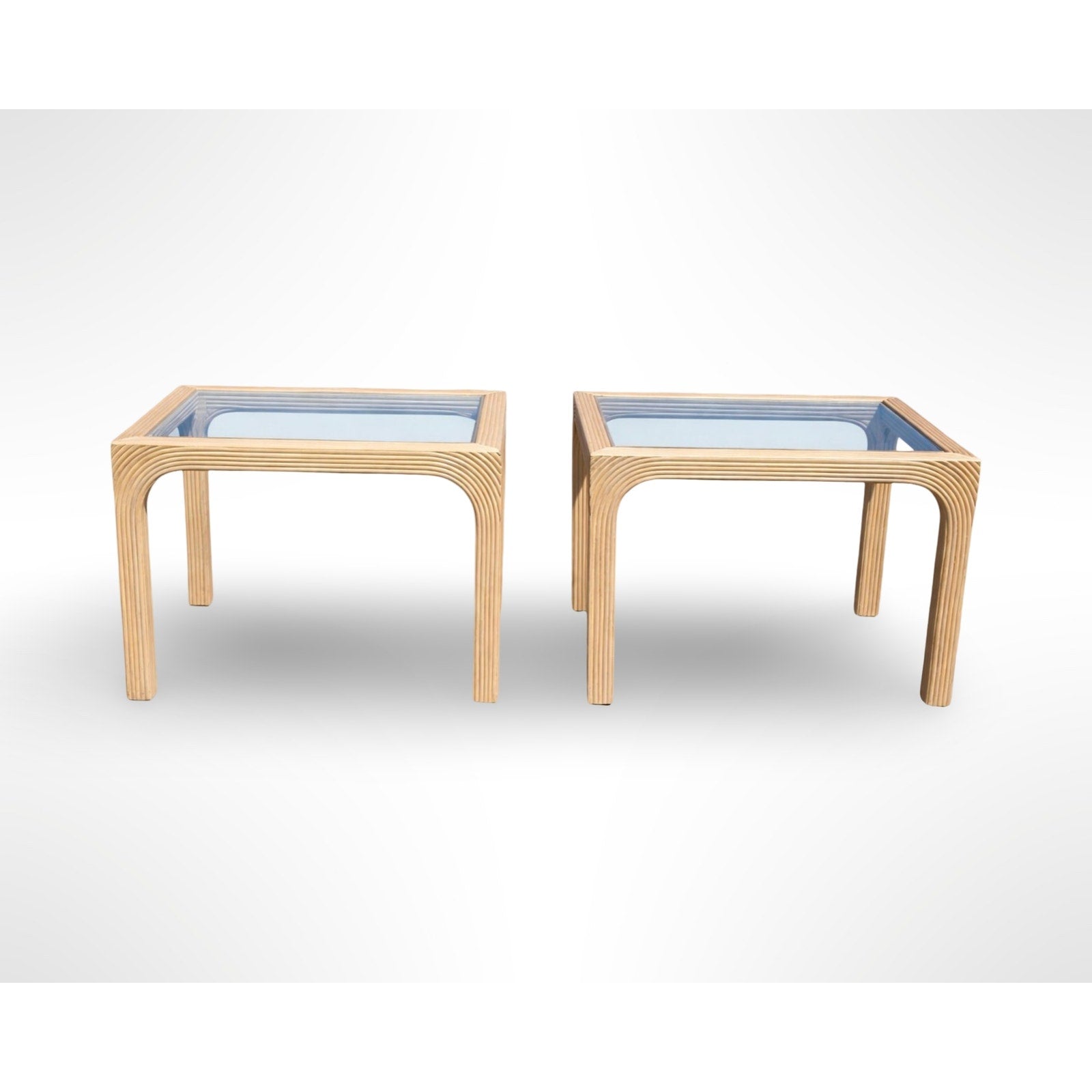 Pair of vintage split reed side tables with removable glass tops in a mid century modern organic design
