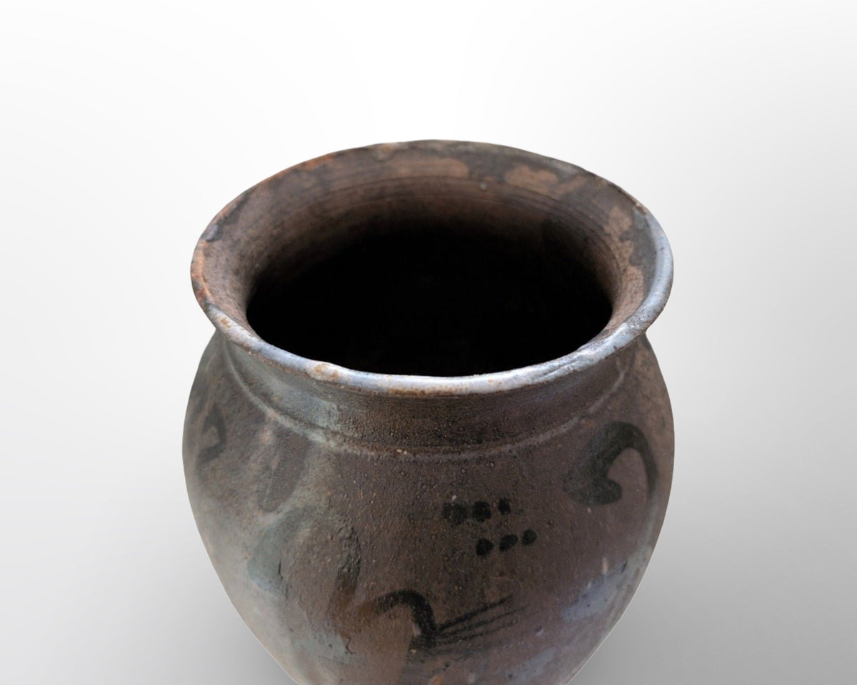 Vintage signed studio pottery vase with abstract dark glaze in organic mid century modern style