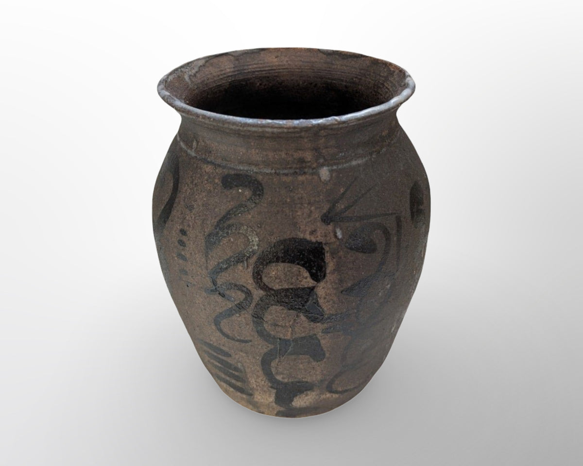 Vintage signed studio pottery vase with abstract dark glaze in organic mid century modern style