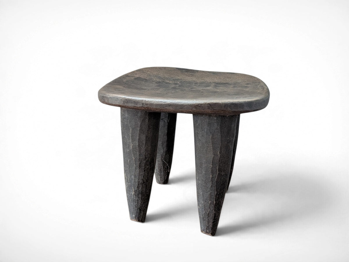 Vintage rustic African Senufo stool hand carved from solid wood, four tapered legs, 12.25x10.25x10.25 inches