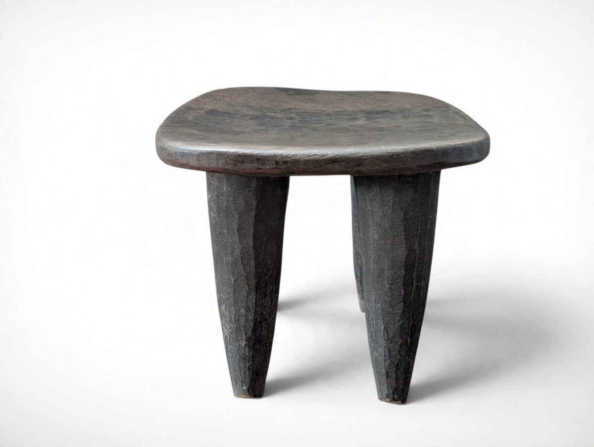 Vintage rustic African Senufo stool hand carved from solid wood, four tapered legs, 12.25x10.25x10.25 inches