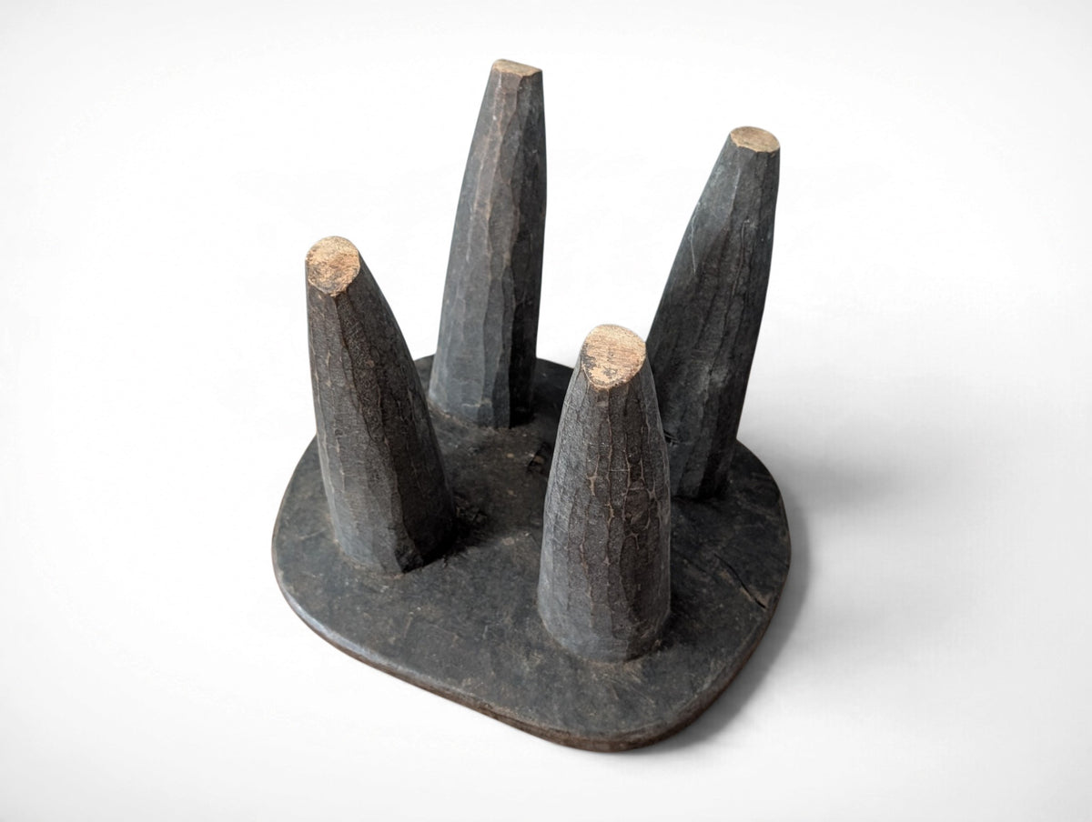 Vintage rustic African Senufo stool hand carved from solid wood, four tapered legs, 12.25x10.25x10.25 inches