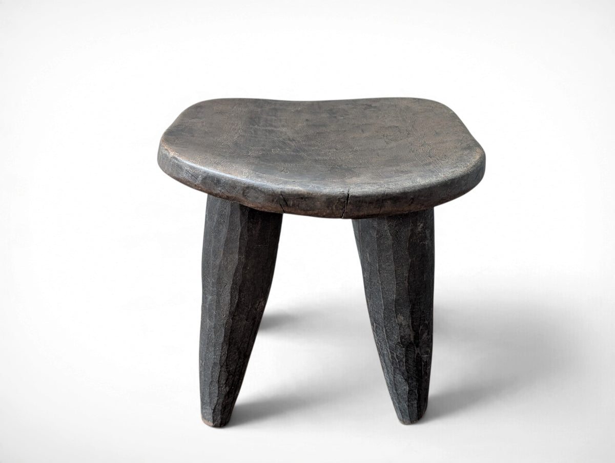 Vintage rustic African Senufo stool hand carved from solid wood, four tapered legs, 12.25x10.25x10.25 inches