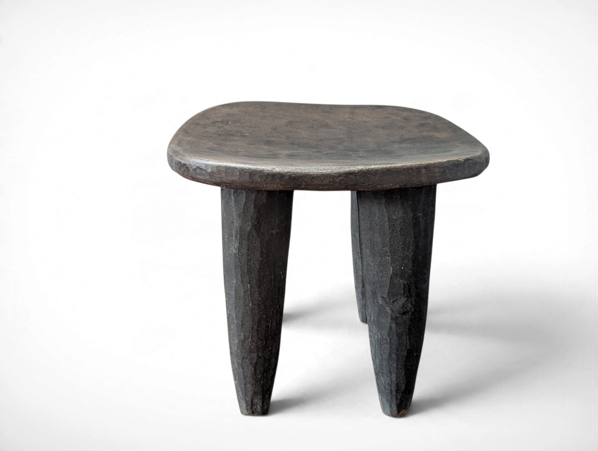 Vintage rustic African Senufo stool hand carved from solid wood, four tapered legs, 12.25x10.25x10.25 inches