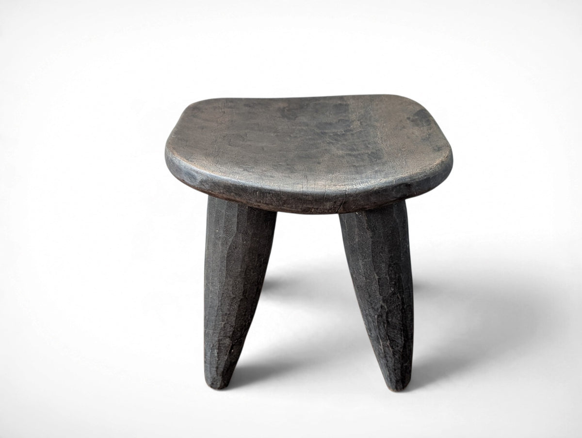 Vintage rustic African Senufo stool hand carved from solid wood, four tapered legs, 12.25x10.25x10.25 inches