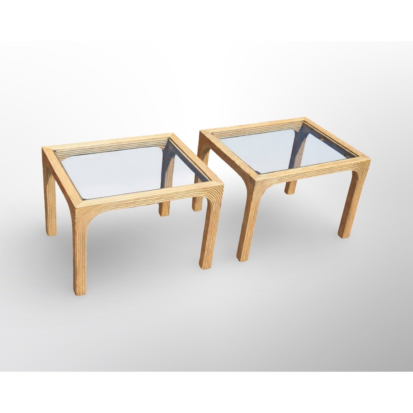 Close up detail of split reed rattan texture and glass top mid century modern side table