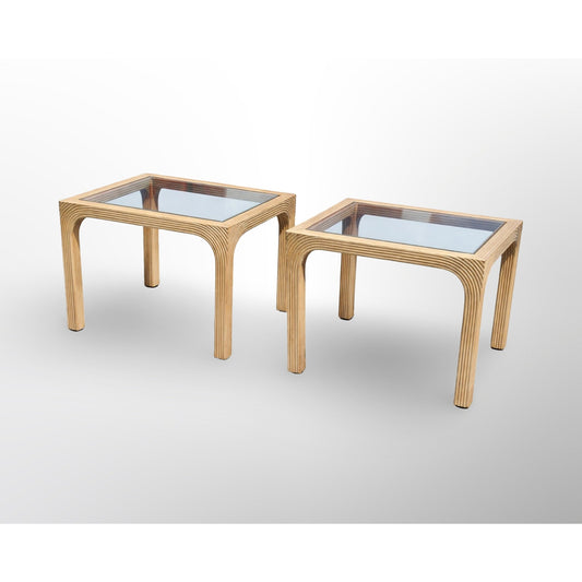 Pair of split reed side tables with glass tops in mid century modern rattan design