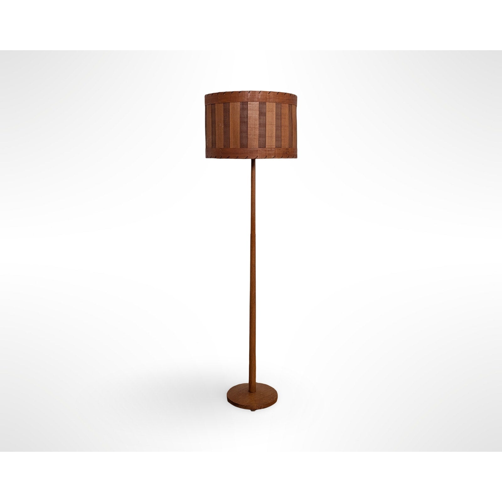 Swedish teak floor lamp with handcrafted wood shade and leather trim in Scandinavian mid century modern design