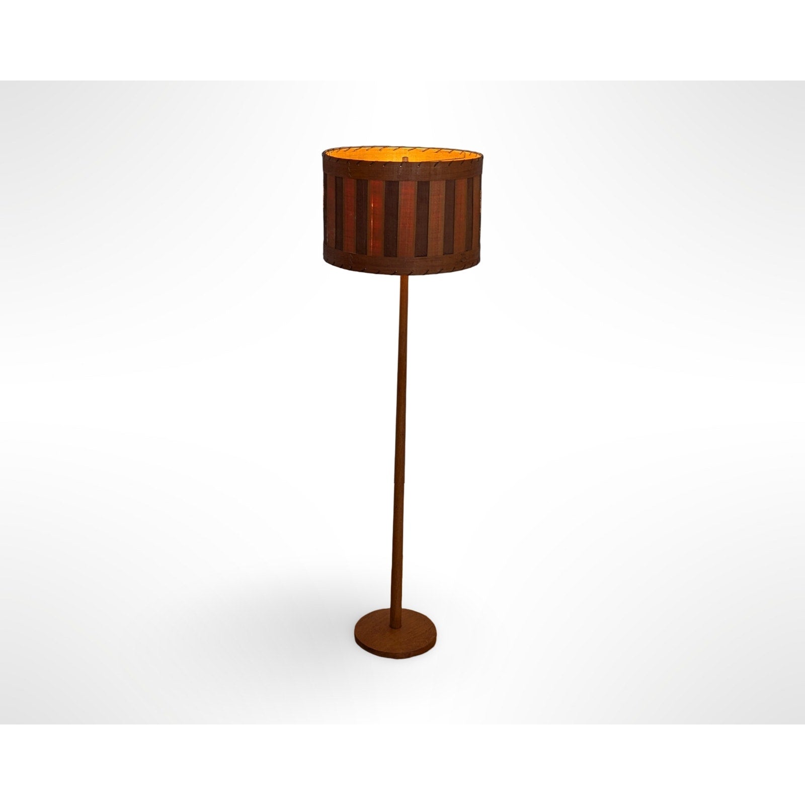 Swedish teak floor lamp with handcrafted wood shade and leather trim in Scandinavian mid century modern design