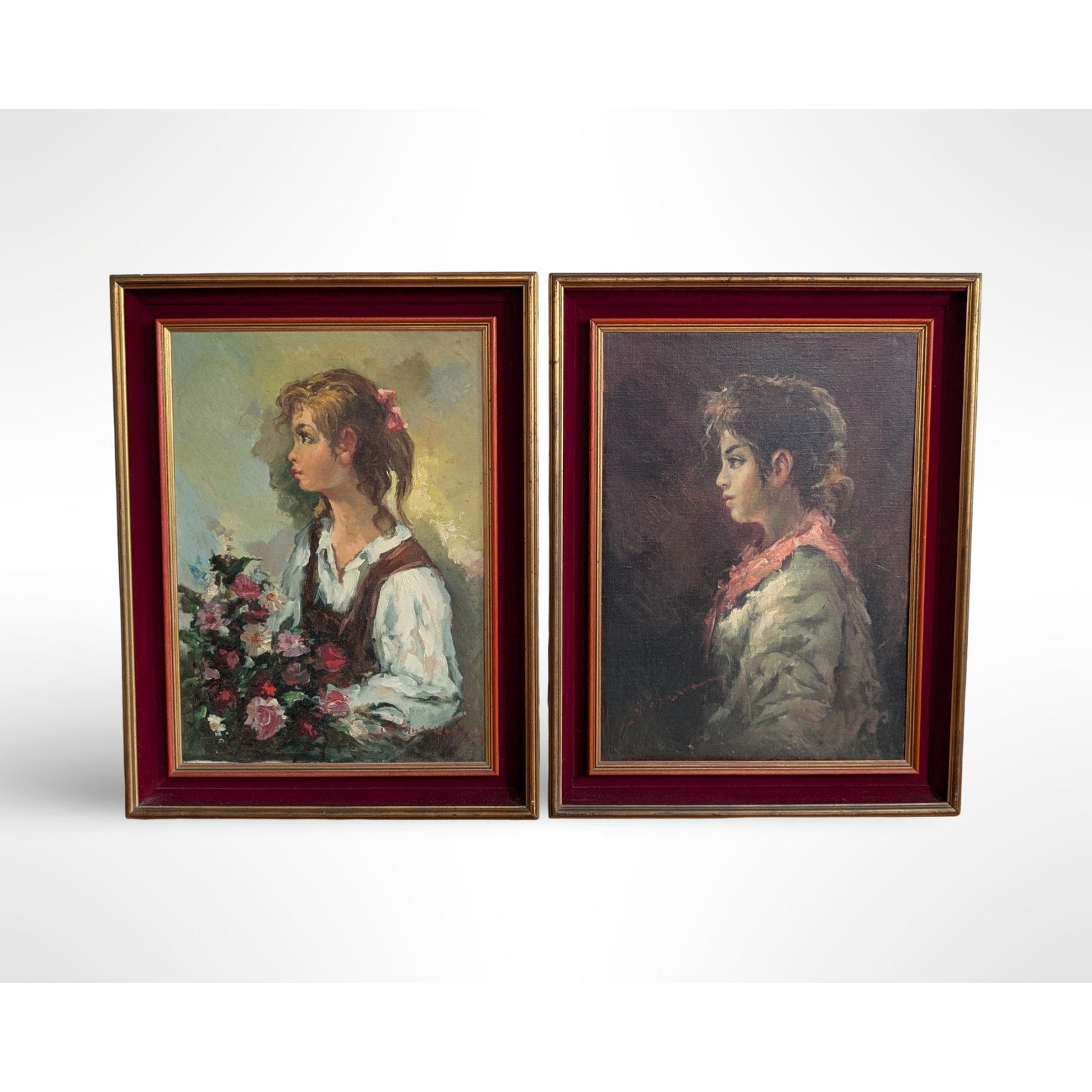 Pair of vintage signed portrait oil paintings in gilt wood frames with red velvet liners measuring 27 by 35 inches