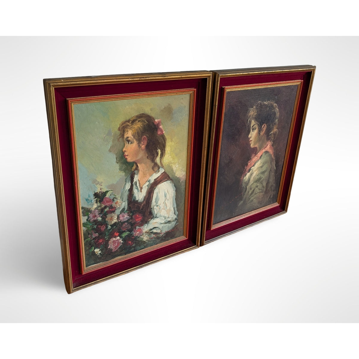 Pair of vintage signed portrait oil paintings in gilt wood frames with red velvet liners measuring 27 by 35 inches