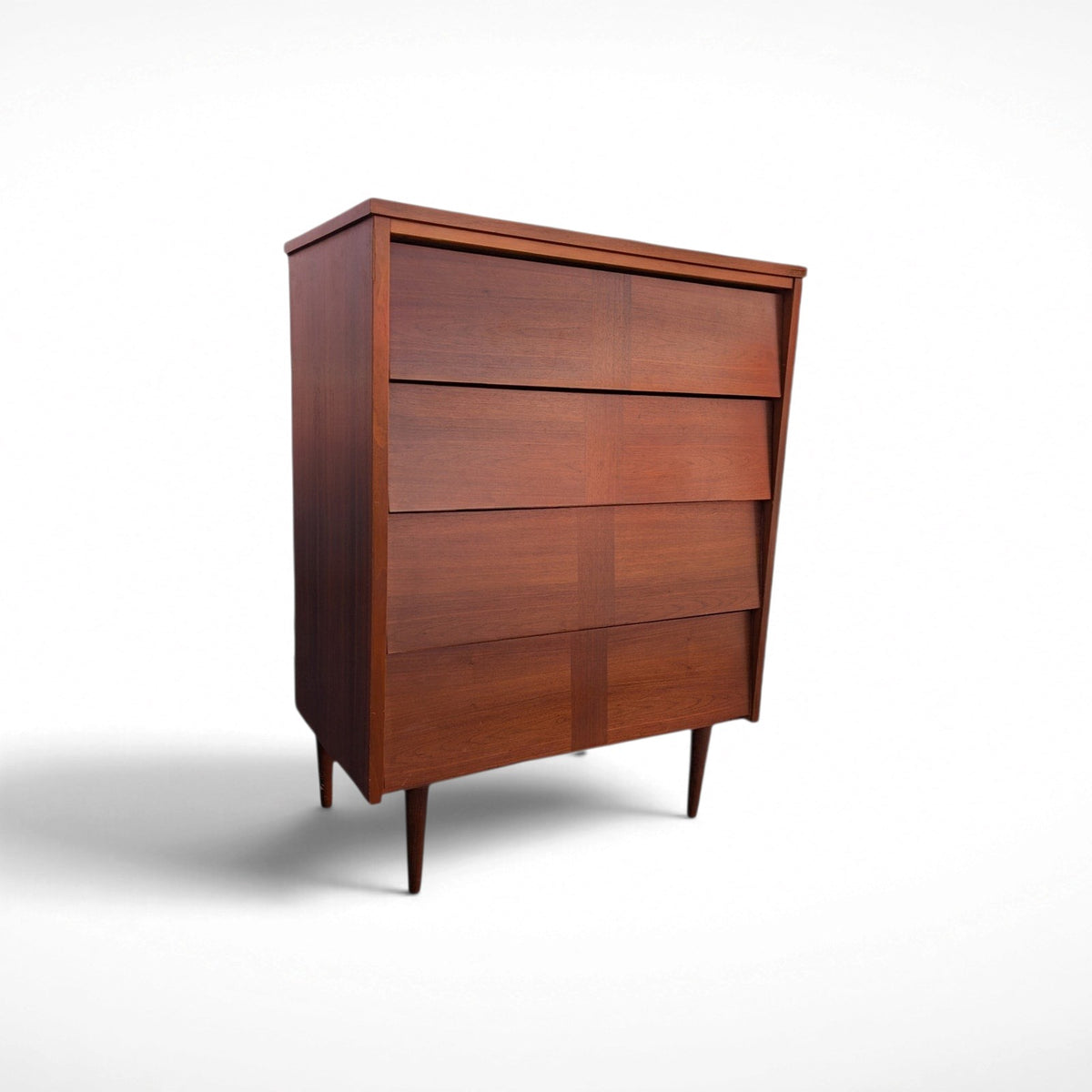 Restored Ward Mfg. mid century modern walnut tall 4-drawer dresser with sculpted geometric drawer fronts and tapered legs