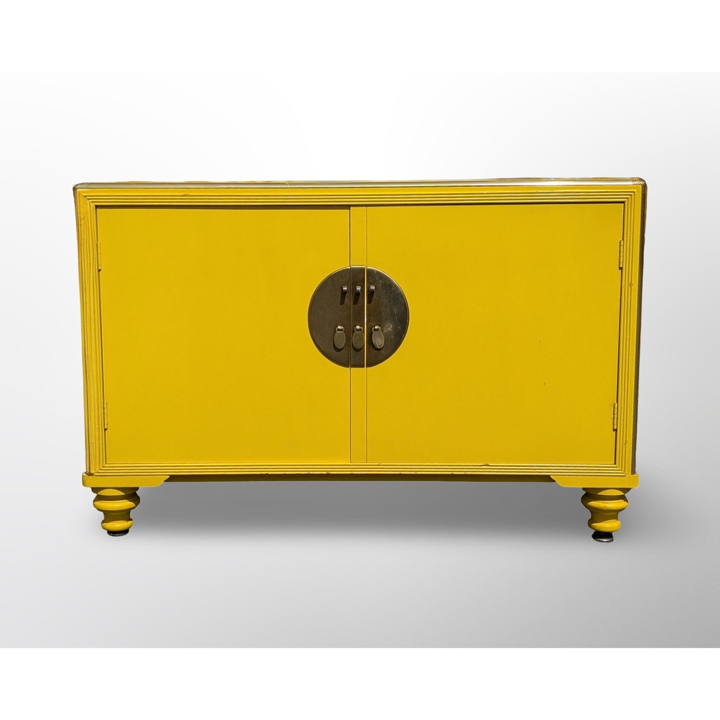 Side profile of Michael Taylor for Baker yellow lacquer cabinet mid century modern design